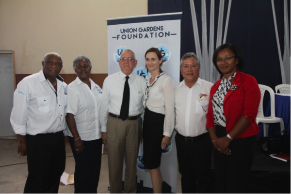 Members of the Union Garden Foundation pose for a photo with Minister of Education, Hon. Rev. Ronald Thwaites(3rd left).  Shown, from left, are Glen Christian, Marva Christian, Melanie Subratie,  Gary ‘Butch’ Hendrickson, and Simone Murdock.
